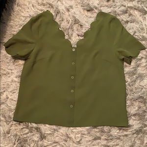 Green scalloped blouse